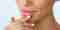 Close Up Woman Touching Lips